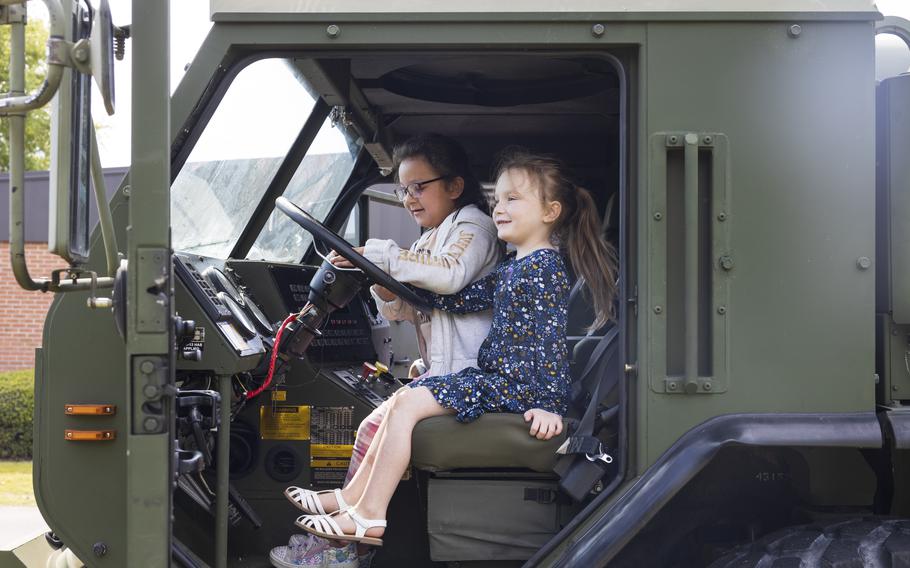 Students at Oaks Road Academy explore the inside of an MKR18 Logistics Vehicle System Replacement during a career fair in New Bern, N.C., Friday, April 19, 2024. 