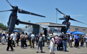Visitors check out an Air Force CV-22 Osprey on display during the Japanese-American Friendship Festival at Yokota Air Base, Japan, May 18, 2024. 