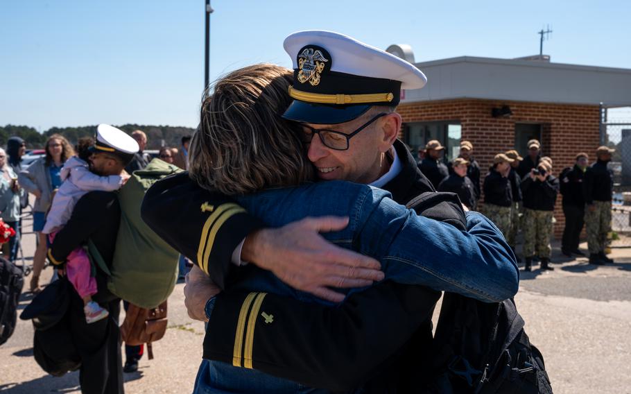 Lt. Jerry Ireland, assigned to the Harpers Ferry-class dock landing ship USS Carter Hall (LSD 50), part of the Bataan Amphibious Ready Group (ARG), greets his family as the Carter Hall returns to Joint Expeditionary Base Little Creek-Fort Story, Thursday, March 21, 2024.