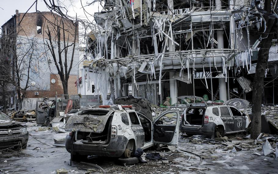 Damaged vehicles and buildings in Kharkiv city center in Ukraine, Wednesday, March 16, 2022. Russia and Ukraine projected optimism ahead of another scheduled round of talks Wednesday, even as Moscow’s forces rained fire on Kyiv and other major cities in a bid to crush the resistance that has frustrated Kremlin hopes for a lightning victory. 