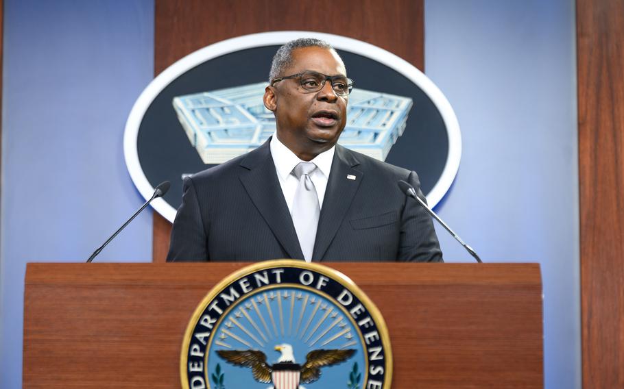 Defense Secretary Lloyd Austin briefs reporters at the Pentagon on Feb. 19, 2021.  Austin said Wednesday that national security could be at risk and Defense Department personnel might not receive their regular paychecks should Congress not vote to suspend the U.S. debt limit.