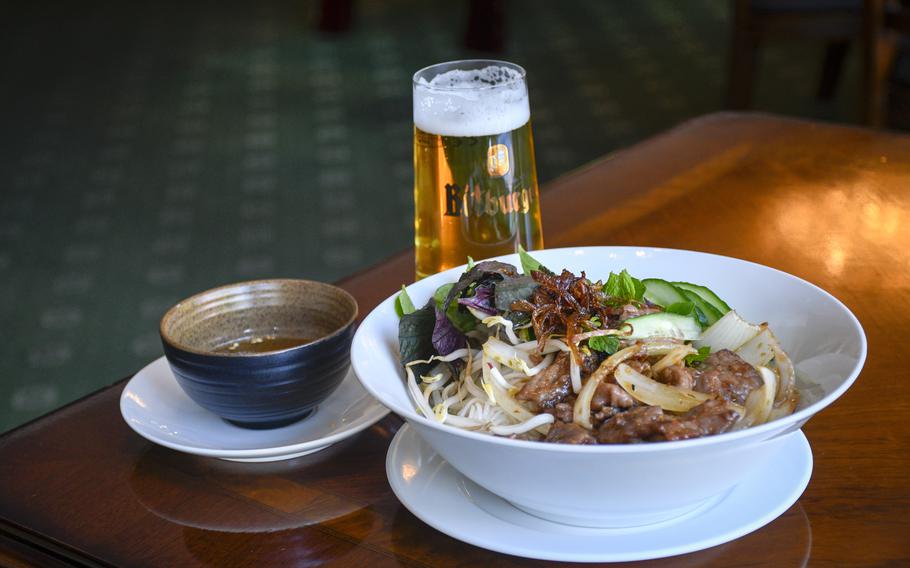 Pho Viet offers Vietnamese specialties such as bun thit bo xao, a dish of rice noodles with fried beef, chili, herbs, bean sprouts and fish sauce. The restaurant is near the Kaiserbrunnen fountain in downtown Kaiserslautern, Germany. 