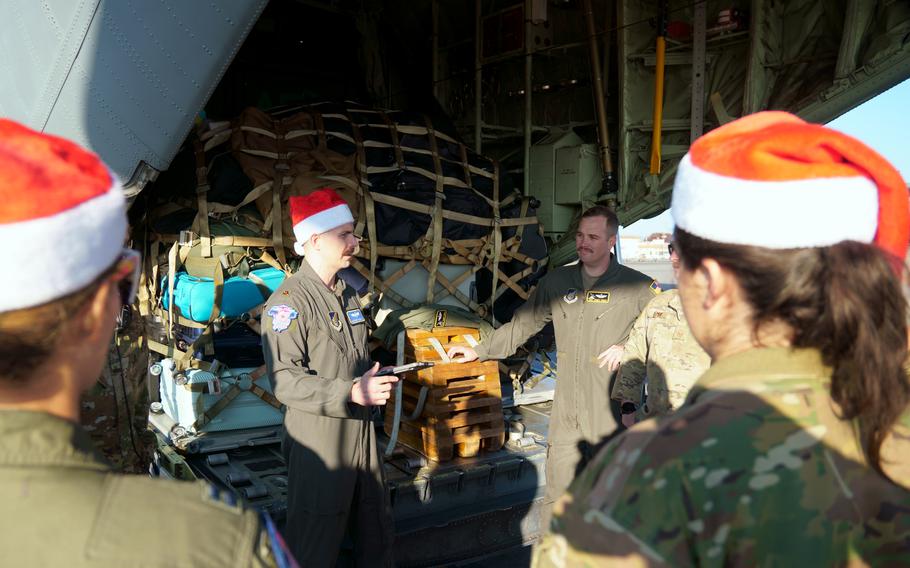 A C-130J Super Hercules crew prepares to take off from Yokota Air Base, Japan, for Operation Christmas Drop, Monday, Nov. 27, 2023. The humanitarian-aid mission serves remote islanders in the Federated States of Micronesia and Republic of Palau.