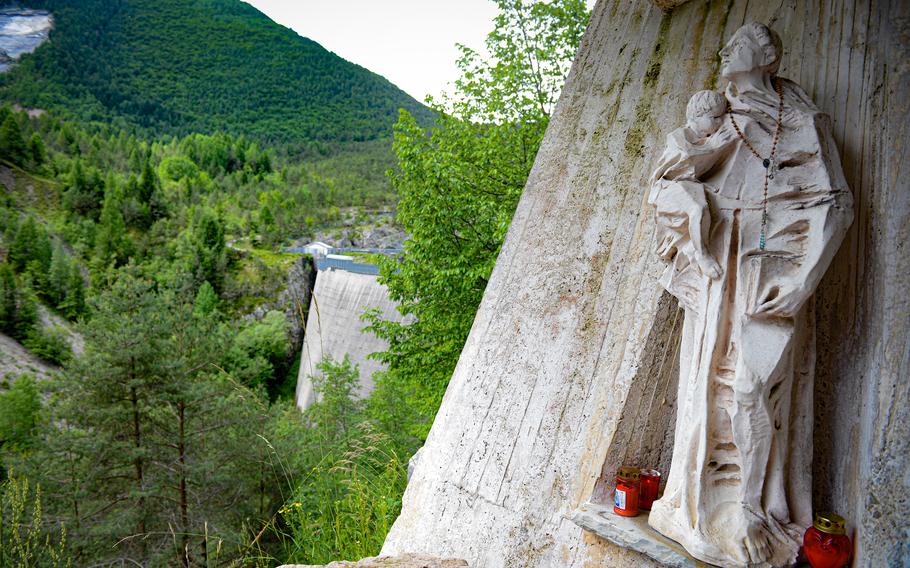 A statue honoring the 1,910 Italian villagers killed in the 1963 Vajont Dam disaster. The dam has not been in use since then.