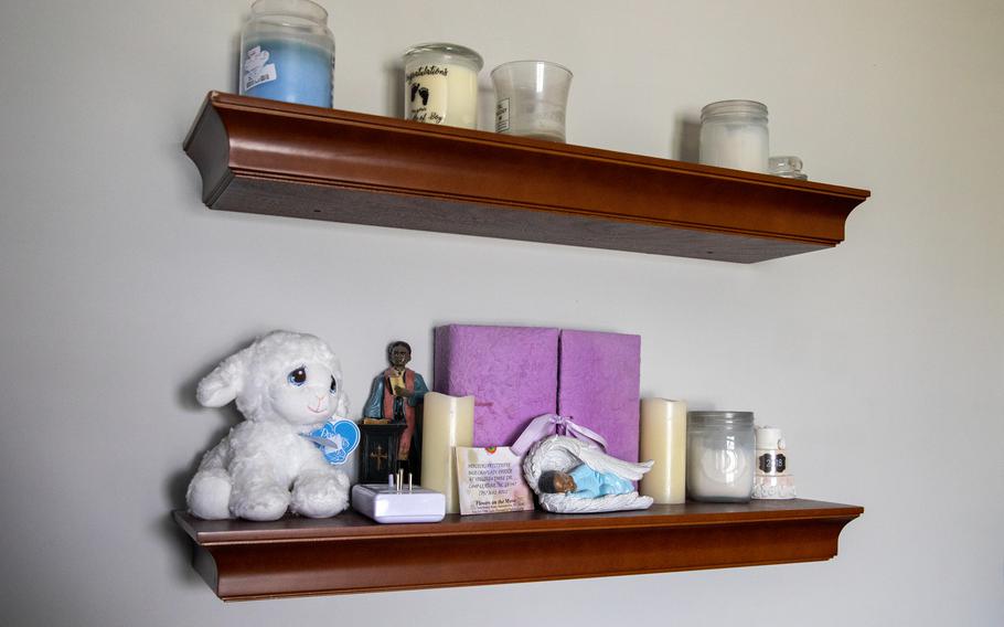A memory box for Primas Petitfrere sits on a shelf in his parents’ bedroom at their home in Spotsylvania, Va.