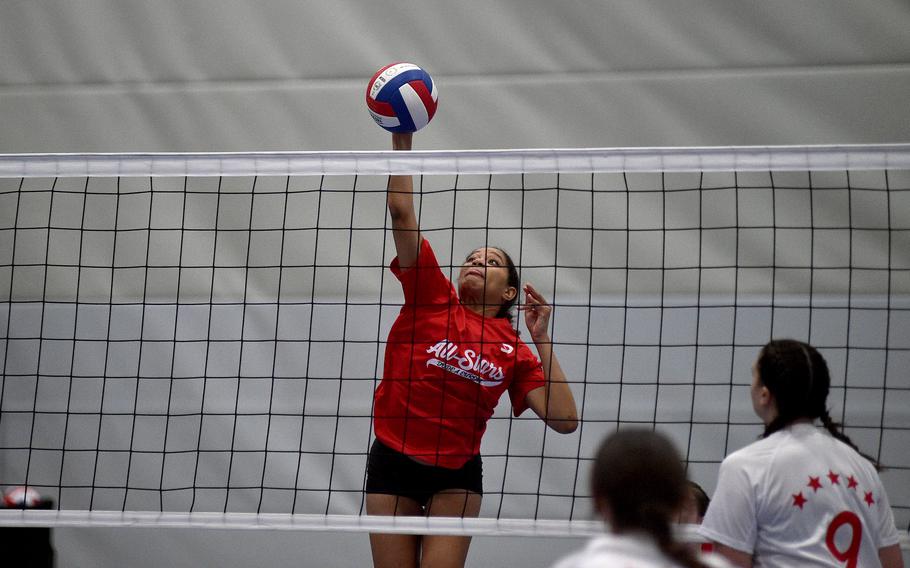 Red Team's A'Lydia McNeal of Lakenheath spikes the ball during a DODEA-Europe all-star volleyball match on Nov. 4, 2023, at Ramstein High School on Ramstein Air Base, Germany.
