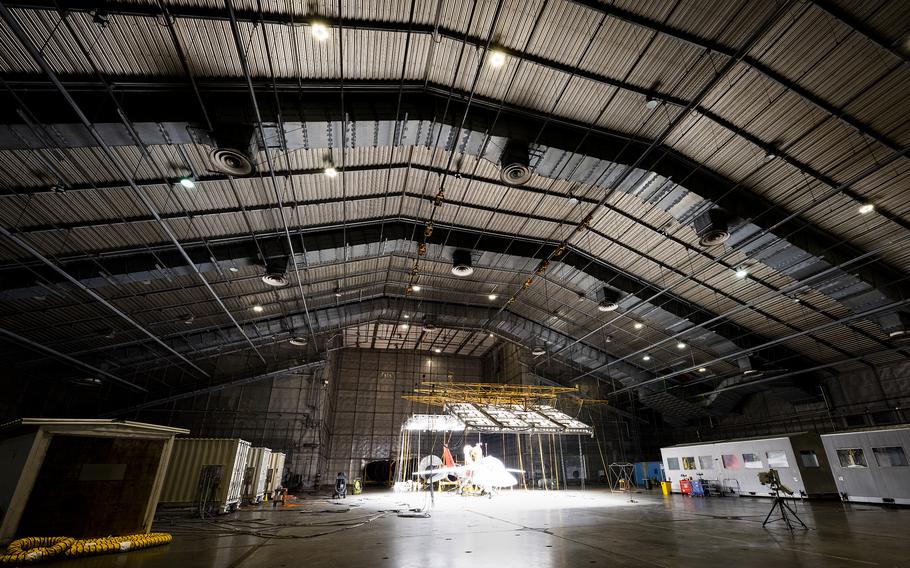 A  T-7A Red Hawk sits under bright lights used to create heat in the McKinley Climatic Lab at Eglin Air Force Base, Fla.