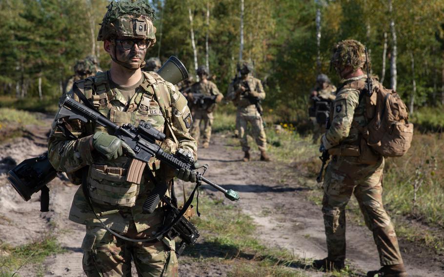 U.S. Army Pfc. Bishop Durham, a grenadier with the 1st Infantry Brigade Combat Team, trains with Latvian and Polish troops in Adazi, Latvia, on Sept. 16, 2023. The unit will be relieved in Europe by soldiers of the 3rd Infantry Brigade Combat Team from Fort Campbell, Ky.
