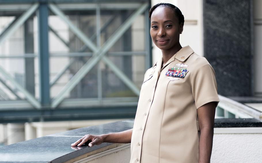 Command Master Chief Samira McBride wears the maternity Navy service khaki uniform at the Joint Women’s Leadership Symposium at Norfolk, Va., in July 2022. 
