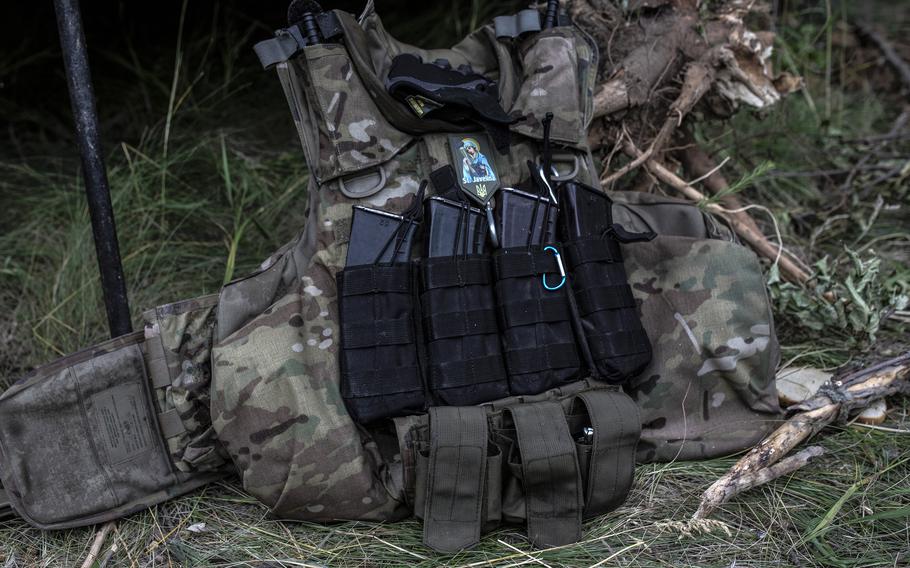 Ammunition magazines are mounted on a Ukrainian soldier’s flak jacket outside the Ukrainian city of Lysychansk.