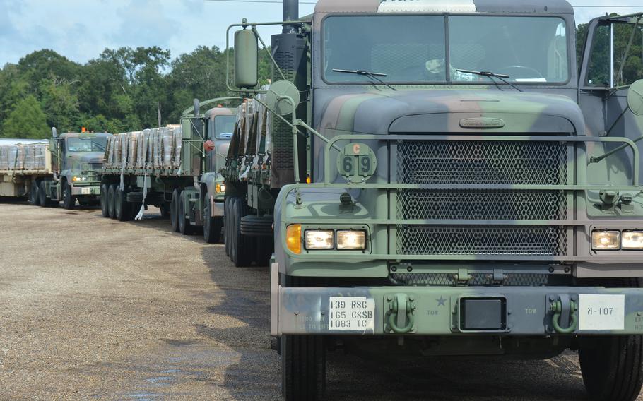 The Louisiana National Guard activated about 4,900 troops in advance of Hurricane Ida and received support of about 400 additional troops from three states. The Guard staged high-water vehicles and rescue boats and began clearing roads after the storm passed Monday morning. 