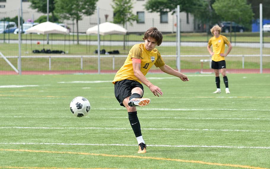 Stuttgart captain Itzak Sandoval takes a free kick during a Division I semifinal of the DODEA European soccer championships against Ramstein on May 22, 2024, at Kaiserslautern High School in Kaiserslautern, Germany.