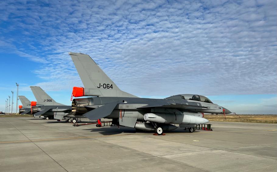 F-16 fighter jets sit on the tarmac at the training center at the 86th Air Base near Fetesti, Romania. Ukrainian pilots will soon start F-16 training at the base.