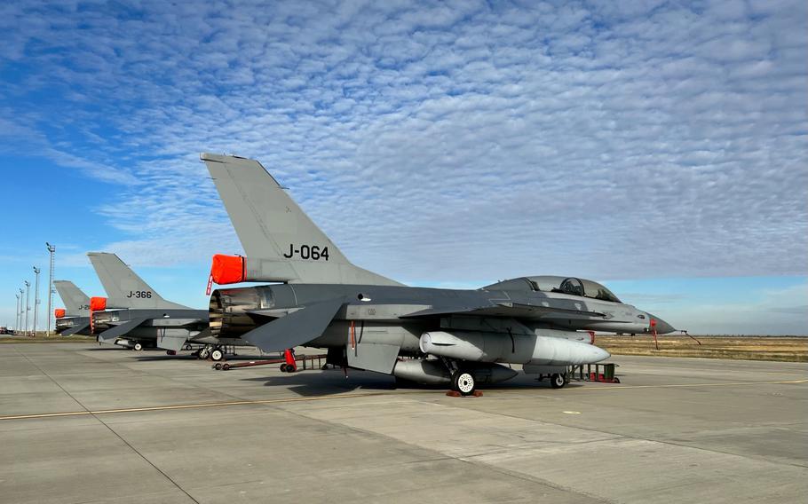F-16 fighter jets sit on the tarmac at the training center at the 86th Air Base near Fetesti, Romania. Ukrainian pilots will soon start F-16 training at the base.