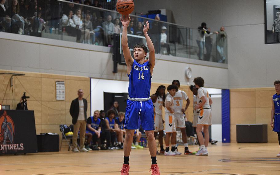 Hohenfels' Theo Reyes shoots from the free throw line during a basketball game on Jan. 26, 2024, at Spangdahlem High School in Spangdahlem, Germany.