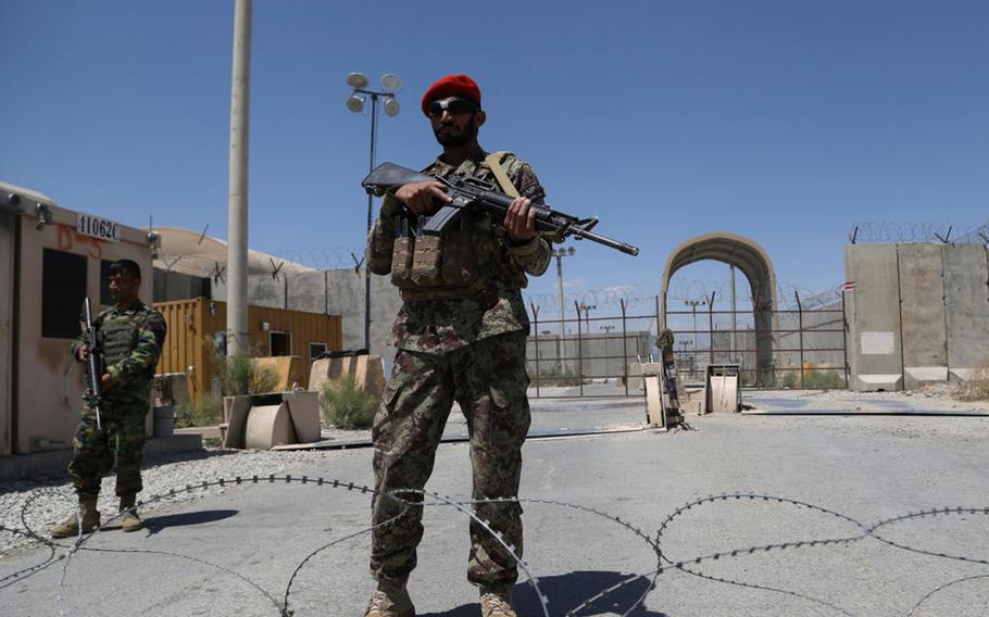 An Afghan National Army (ANA) soldier stands guard at Bagram Air Base, after all U.S. and NATO troops left, some 70 kilometers north of Kabul on July 2, 2021.