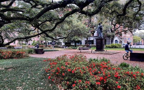 A monument to John Wesley, who lived briefly in Savannah, Ga., before he helped found the Methodist Church, anchors Reynolds Square.MUST CREDIT: Photo for Washington Post by Alex Pulaski