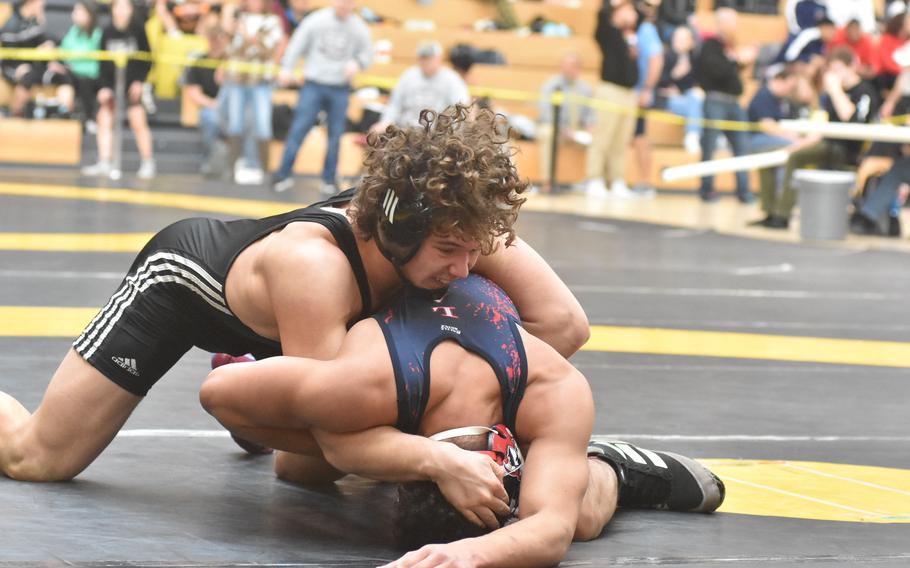 Vilseck’s Garrett Hyten controls Lakenheath’s Jaden DuBois at 190 pounds Friday, Feb. 9, 2024, at the DODEA European Wrestling Championships in Wiesbaden, Germany.