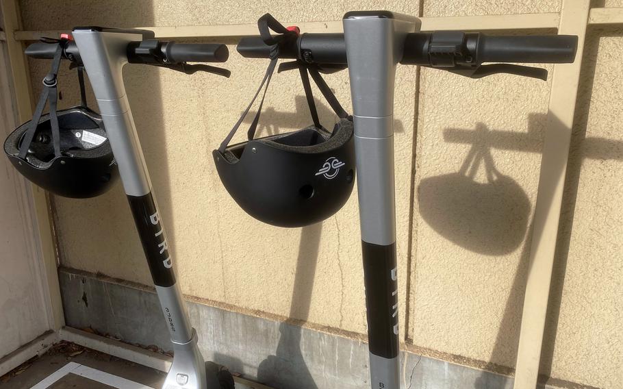 Safety precautions for the e-scooter rentals at Yokota Air Base, Japan, include helmets and slow zones in areas with high pedestrian traffic. 