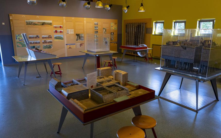 The volcano workshop displays a detailed diorama of the underground caverns and an interactive area on Sept. 21, 2024, in Mendig, Germany. Visitors can touch volcanic rocks and learn about their textures and formation.