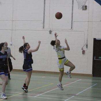 Alconbury's Aspen Williams takes a shot after a break away. Williams was the leading scorer for the Dragons on Friday, Jan. 20, 2023, with 12 points. 