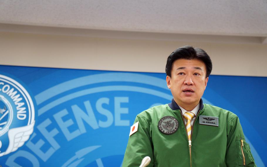 Japan's newly appointed defense minister, Minoru Kihara, visits Air Defense Command at Yokota Air Base in western Tokyo, Tuesday, Oct. 10, 2023. 