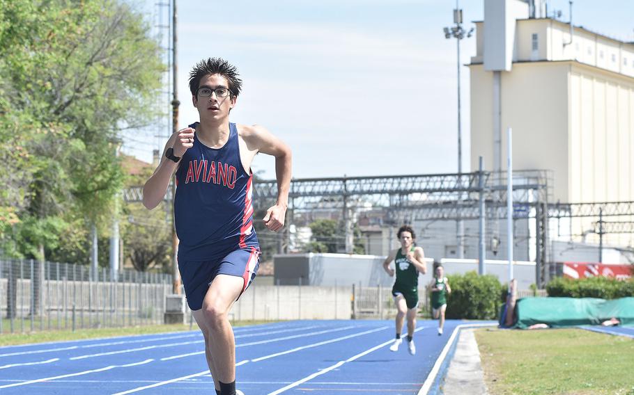 Aviano's Zach Taylor expands his lead in the boys 800 meters Saturday, April 29, 2023, on his way to victory in the event at Pordenone, Italy.