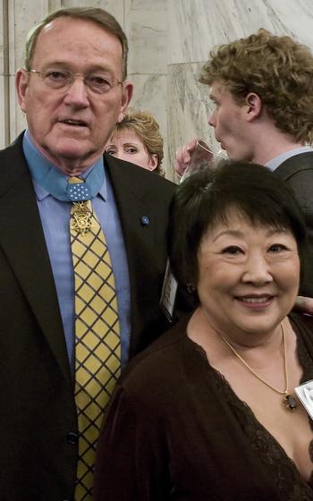 Medal of Honor recipient Roger Donlon and his wife, Norma, arrive at a ceremony in Washington in 2007.