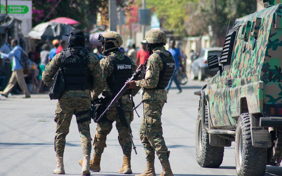 Haitian police officers deploy in Port-au-Prince, Haiti, on March 9, 2024. Sporadic gunfire rang out in Port-au-Prince late March 8, an AFP correspondent there heard, as residents desperately sought shelter amid the recent explosion of gang violence in the Haitian capital.