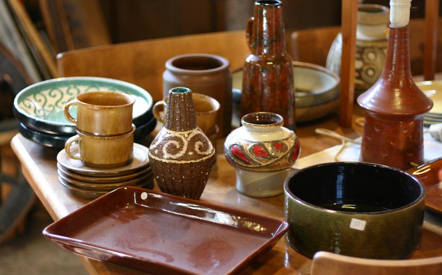 Used earthenware pottery for sale in a thriftstore in Vadstena, Sweden.