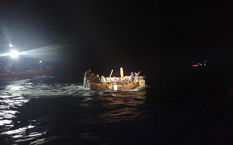 A small boat crew from the U.S. Coast Guard Cutter Hamilton (WMSL 753) prepares to interdict a rustic vessel about 30 miles north of Cayo Cruz Del Padre, Cuba, on April 30, 2023. Twenty-seven people were repatriated to Cuba May 3, 2023. 