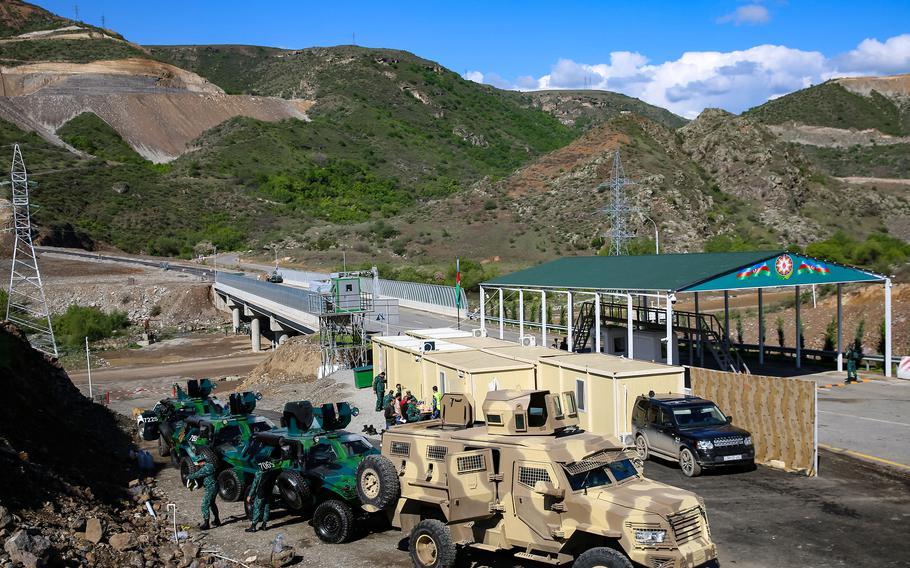 A view of an Azerbaijani checkpoint recently set up at the entry of the Lachin corridor, the Armenian-populated breakaway Nagorno-Karabakh region’s only land link with Armenia, by a bridge across the Hakari river on Tuesday, May 2, 2023. 