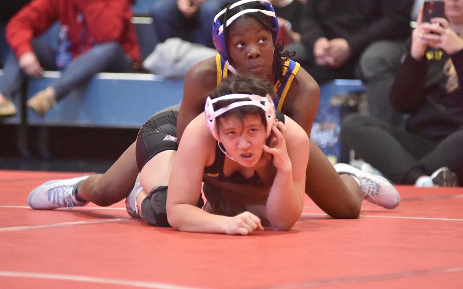 Sigonella's Rickalia Goss controls Vicenza's Lola Leonard in a 120-pound match Saturday, Jan. 14, 2023, at Aviano, Italy.

Kent Harris/Stars and Stripes