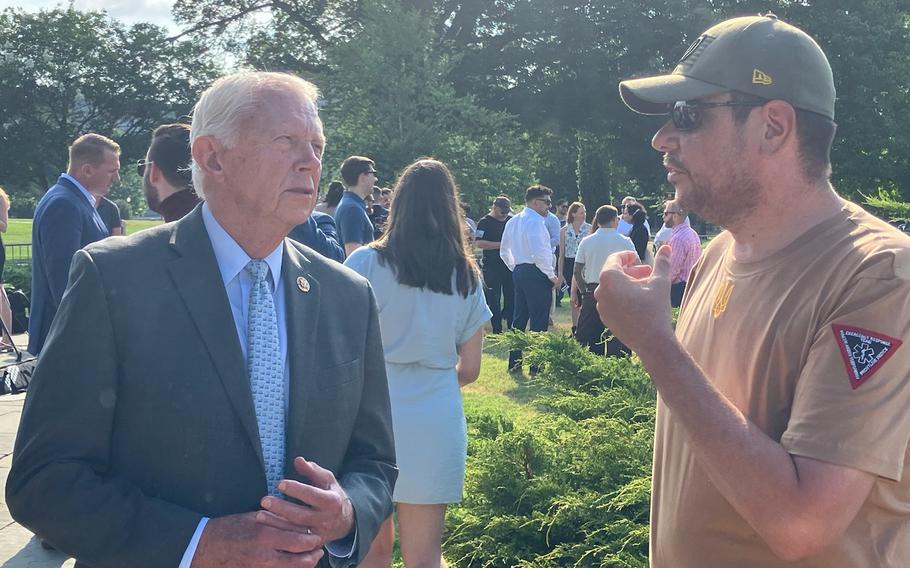 Marine Corps and Army veteran Jonathan Lubecky, right, speaks with Rep. Jack Bergman, R-Mich., following a news conference in Washington on July 10, 2024.
