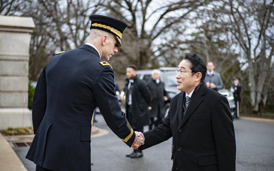 Maj. Gen. Allan M. Pepin greets Japanese Prime Minister Fumio Kishida at Arlington National Cemetery, Arlington, Va., on Jan. 13, 2023.