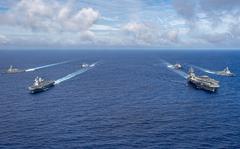  Ther USS Ronald Reagan, USS Antietam, USS Benfold and South Korean ships Sejong the Great, Marado and Munmu the Great steam in formation on June 3, 2022.