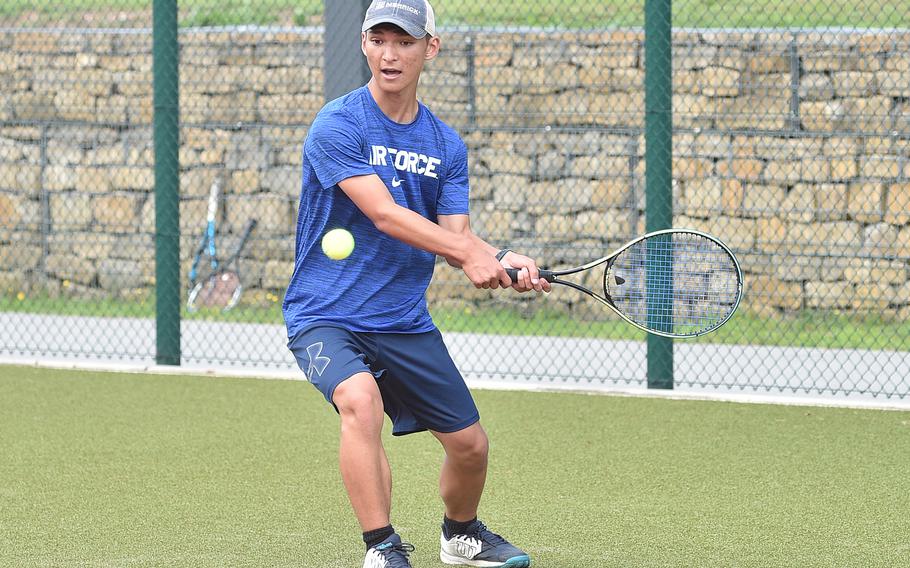 Royal tennis player Dylan Matthews gets ready to backhand a ball during a practice on Aug. 29, 2023, at Ramstein High School on Ramstein Air Base, Germany.