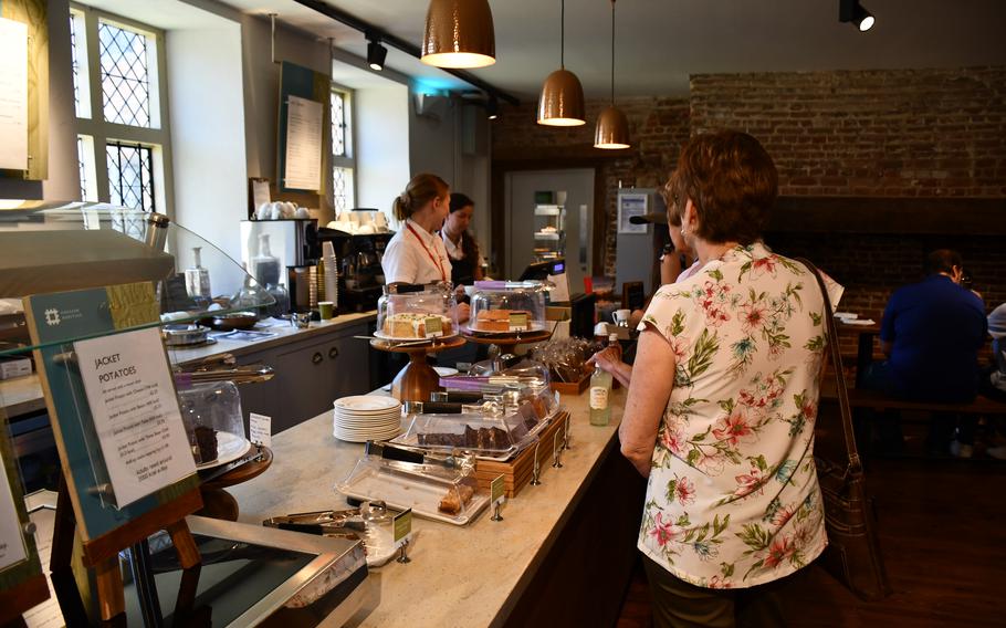 The café with seating area and gift shop are inside the workshop portion of the building that lies on the inside of the courtyard of Framlingham Castle. The workshop was built in 1664. 