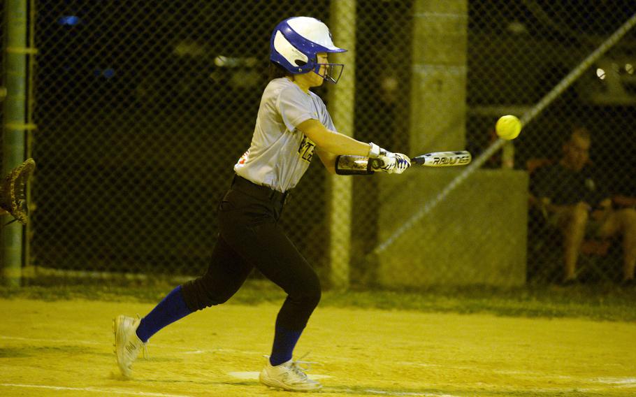 Yokota's Alicia Tanoue gets one of her four hits in eight times at bat during Friday's softball doubleheader. She drove in four runs in a losing cause as Kubasaki swept the Panthers 19-18 and 14-7.