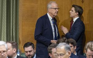 Sen. Jerry Moran, R-Kan., left, speaks with a staffer Thursday, July 24, 2025 in Washington during a Senate Appropriations Committee hearing. (Eric Kayne/Stars and Stripes)