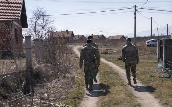 U.S. soldiers conduct a foot patrol in Babush, an ethnic Serbian enclave in Ferizaj, Kosovo, Feb. 22, 2024.