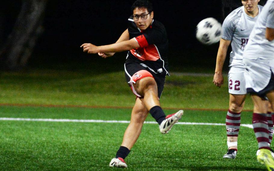 Amin Alipourkashiki boots the ball.