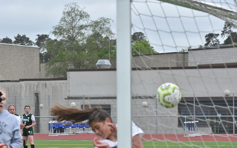 Sigonella's Ryleigh Denton tries to avoid colliding with the post as she follows the ball over the goal line in the Jaguars' 3-0 victory over AFNORTH in the DODEA-Europe girls Division III tournament at Ramstein Air Base, Germany, on Tuesday, May 16, 2023.