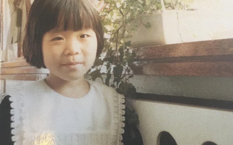 This undated photo provided by Joo-Rei Mathieson shows herself when she was in childhood taken in South Korea. A Brothers Home intake document describes Mathieson as a lost street kid brought in by police. 