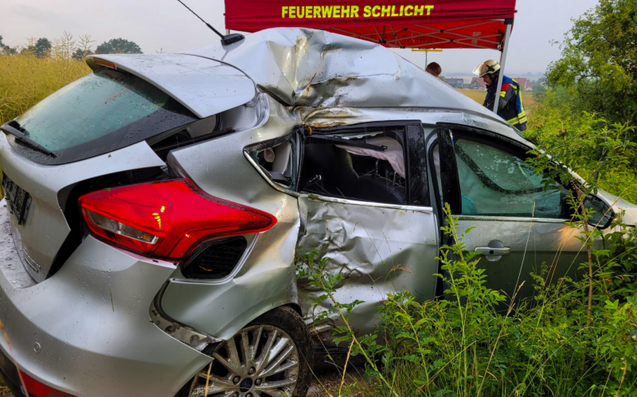 A Ford Focus was wrecked in an accident near Vilseck, Germany, on June 30, 2023. One U.S. soldier died and two others were injured after the car slid off a wet roadway and collided with a tree.