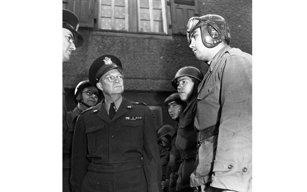 Hed: Question, wrong answer, 1951

Dornheim, Germany, Sep. 29, 1951: Dwight D. Eisenhower discusses maneuvers with some French troops during Operation Jupiter,  a French-led multi-nation NATO exercise in the Rhine river area. 
A Stars and Stripes article reported that Ike had stopped to question a French tank crew and inspected a French half-track. When one soldier hesistated when asked the firing range of the 50-cal. machine gun, Ike answered: "You'd better know. Your life may depend on it some day." 
The SHAPE commander is in Germany to observe the three-day French directed war games. The exercise has some 150,000 Allied troops - including 45,000 Americans of the Army's V Corps - enact a mass counterassault across the Rhine against "enemy" troops dug in on the east bank.

Looking for Stars and Stripes’ historic coverage? Subscribe to Stars and Stripes’ historic newspaper archive! We have digitized our 1948-1999 European and Pacific editions, as well as several of our WWII editions and made them available online through https://starsandstripes.newspaperarchive.com/

META TAGS: Europe; Germany; U.S. Army; SHAPE; Supreme Headquarters Allied Powers; exercise; soldier; dual exercise; Allied Forces; Ike; French army; village; NATO; Ike