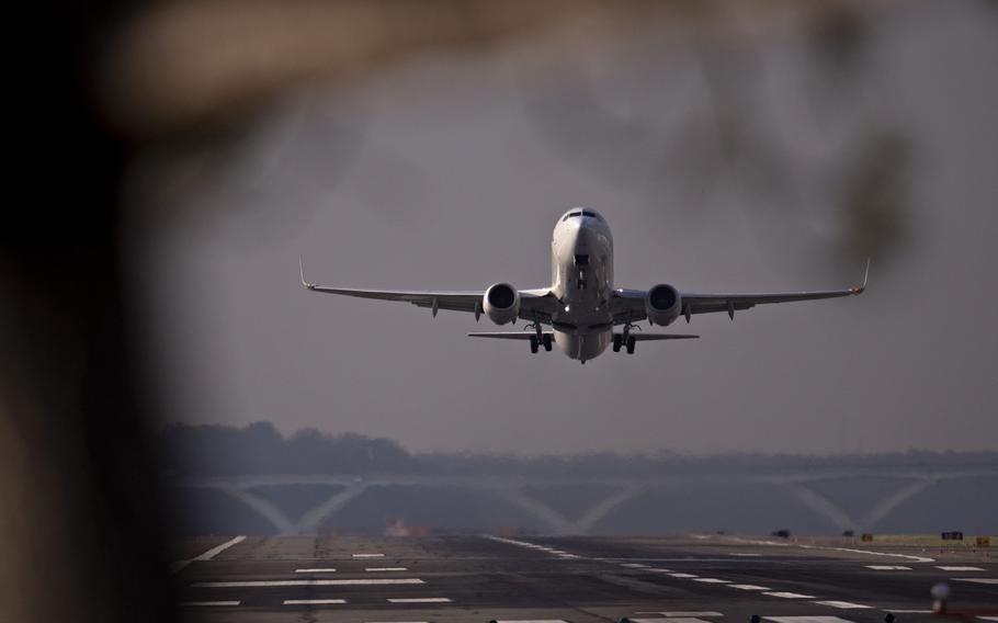 An Alaska Airlines Inc. plane departs Reagan National Airport in Arlington, Va., on April 6, 2020.