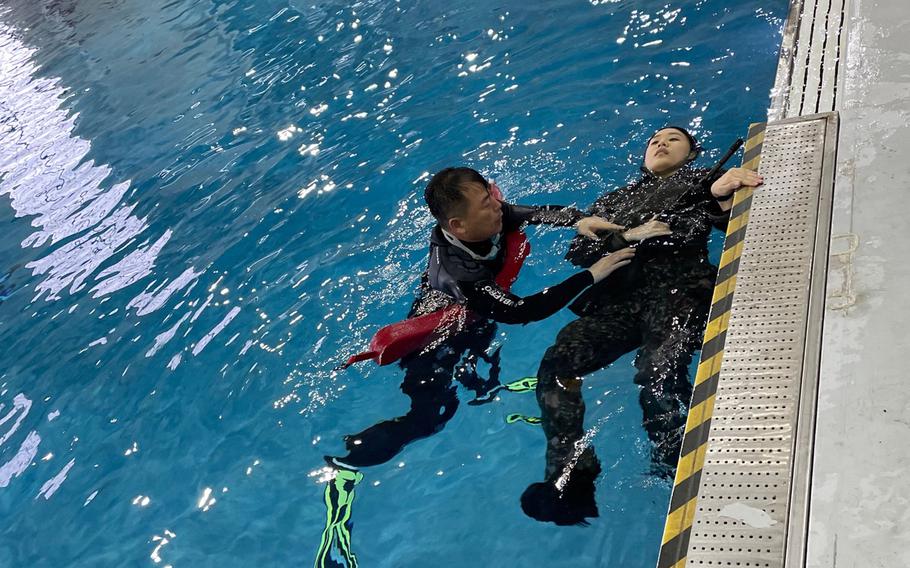 A Korean Military Academy cadet takes part in water survival training at Camp Humphreys, South Korea, Feb. 15, 2022.