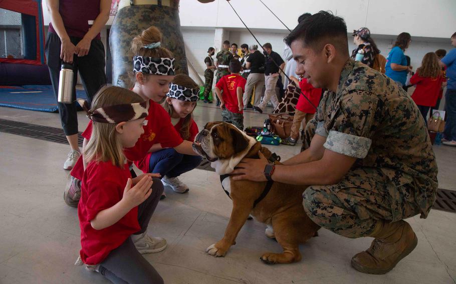 Cpl. Manny, the Marine Corps Recruit Depot San Diego mascot, attends the Marine Aircraft Group 16 Junior Jarhead event and greets kids and families at U.S. Marine Corps Air Station Miramar on July 9, 2022. 