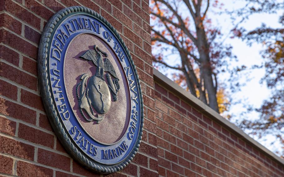 The Marine Corps medallion is seen at Gate One at Marine Corps Base Quantico in Virginia on Nov. 9, 2020. The Pentagon announced in August 2021 that the military will be able to accommodate up to 50,000 Afghan evacuees at seven bases, including Quantico, in the United States